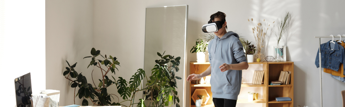 Person using a virtual reality headset in living room